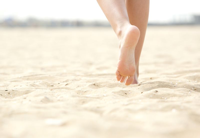 barefoot on the beach